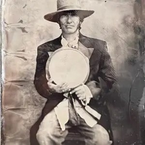 Old-fashioned photograph of seated man
