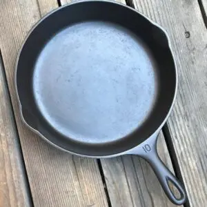 Cast iron skillet on wooden surface