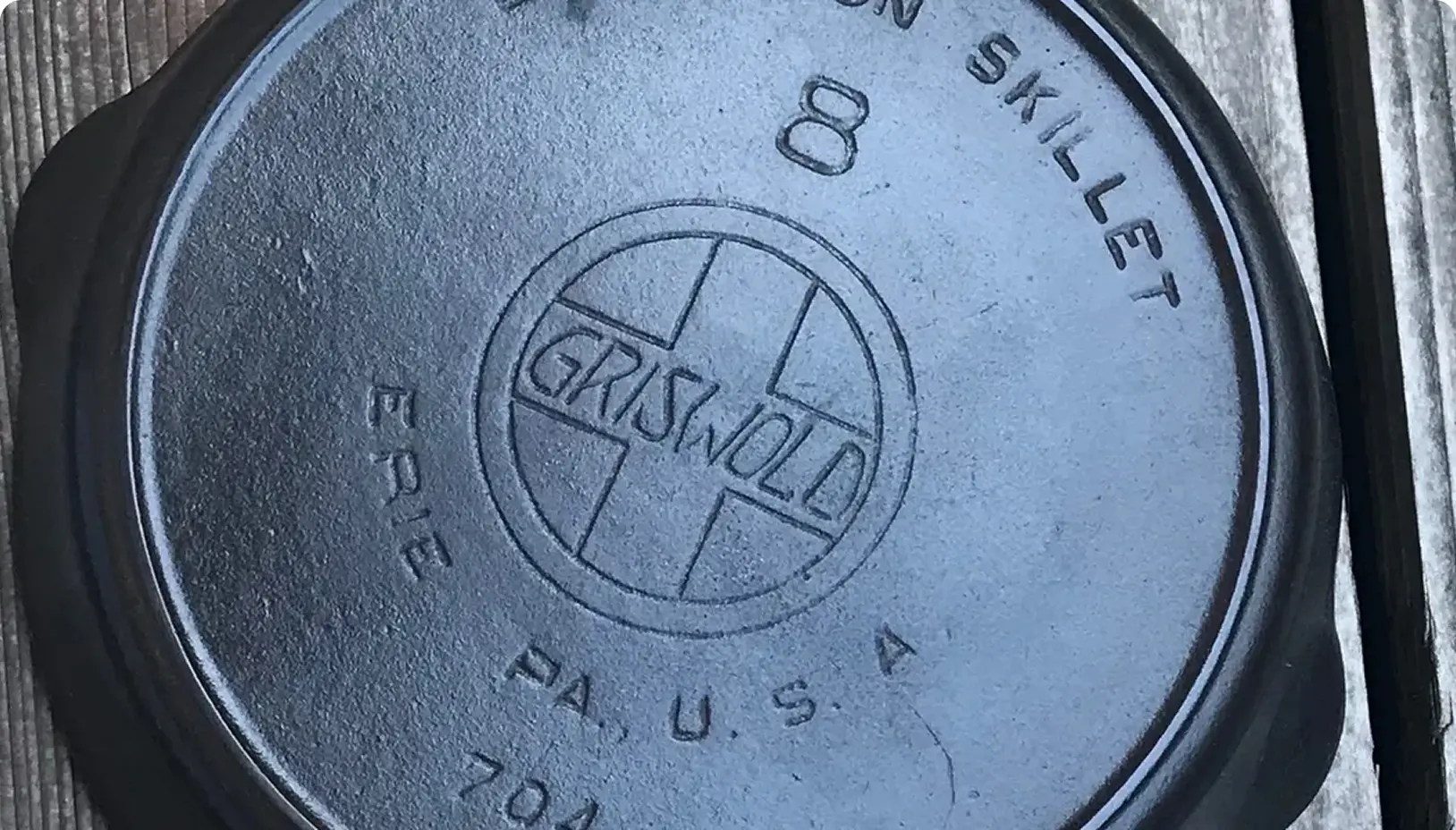 Vintage Griswold skillet on wooden surface