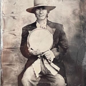Old-fashioned photograph of seated man