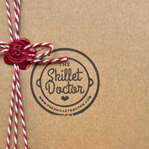 Twine-wrapped box with Skillet Doctor seal